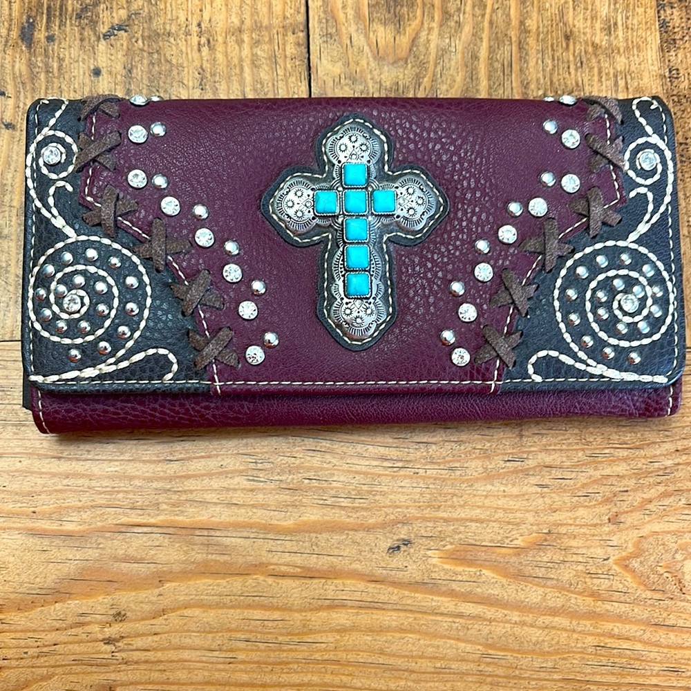 Montana West Wallet never used it is burgundy